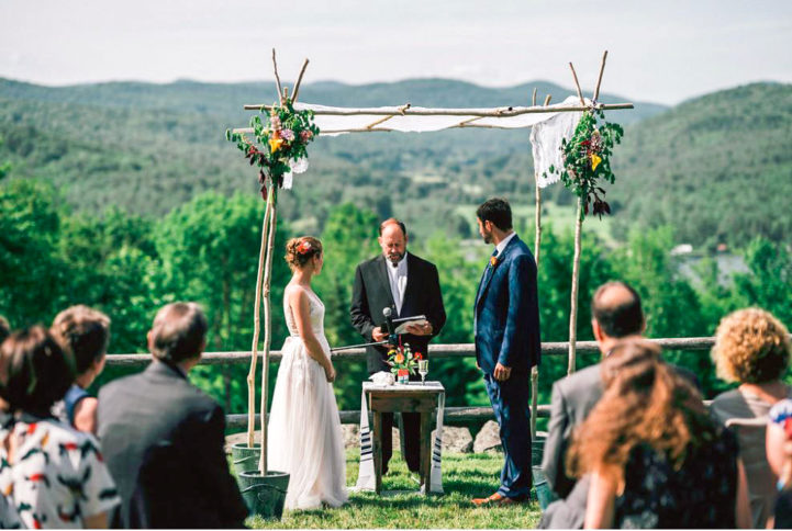 A couple standing at their wedding ceremony.