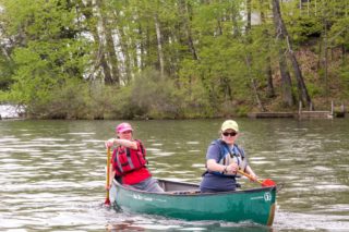 Two people canoeing.