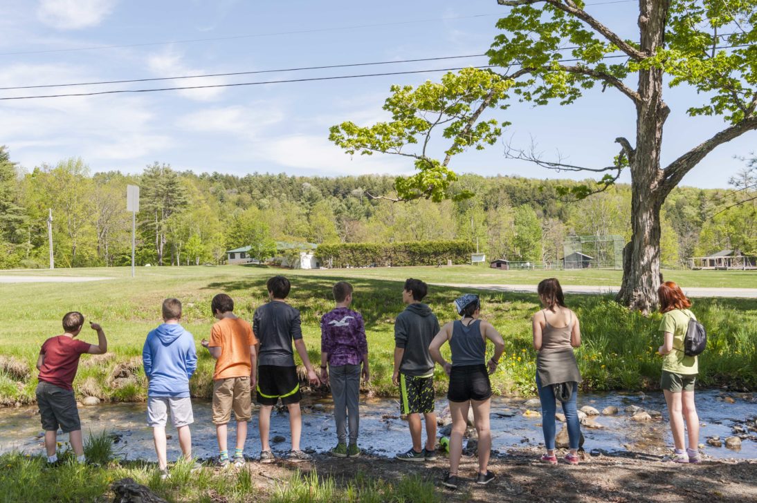 Hulbert homeschool standing by the brook.