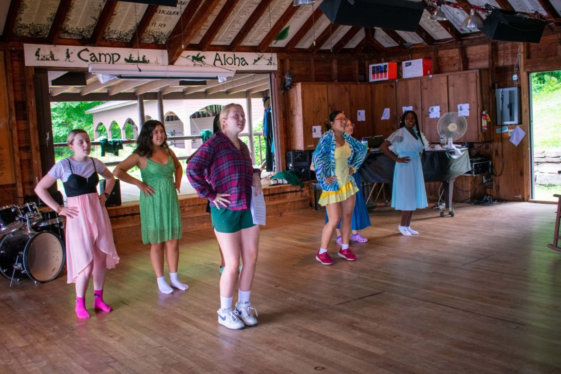 Campers practicing dancing for a show.