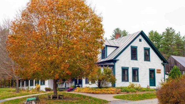 The exterior of the hulbert main house in the fall.