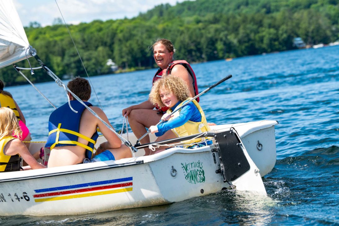 A group on a sailboat together.